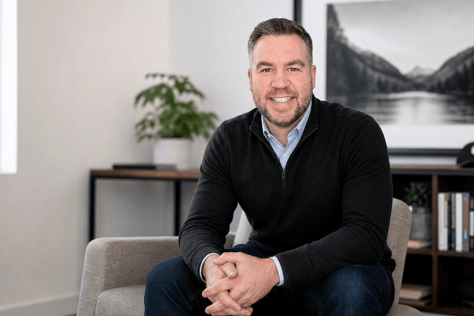 Matt Henderson seated in an office